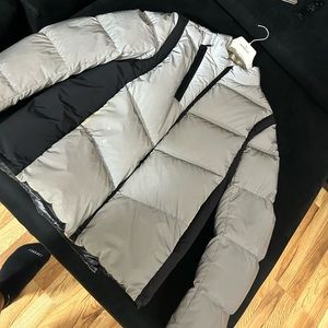 3M MONCLER slight rip on the right sleeve barely noticeable needs to be cleaned